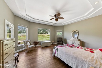 Custom single level home on Genoa's Lakes Golf Course, host of on Genoa Lakes Golf Club - Lakes Course in Nevada - for sale on GolfHomes.com, golf home, golf lot