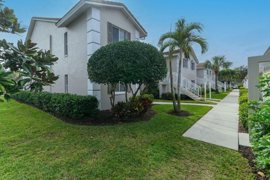 Enjoy refined living in this fully renovated end-unit residence on Glen Eagle Golf and Country Club in Florida - for sale on GolfHomes.com, golf home, golf lot
