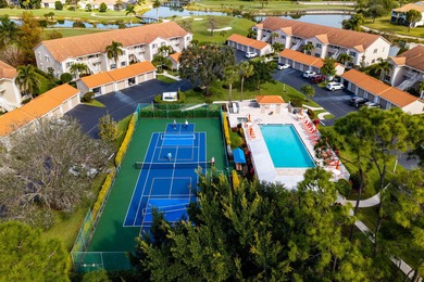 Enjoy refined living in this fully renovated end-unit residence on Glen Eagle Golf and Country Club in Florida - for sale on GolfHomes.com, golf home, golf lot