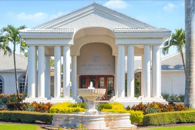 Enjoy refined living in this fully renovated end-unit residence on Glen Eagle Golf and Country Club in Florida - for sale on GolfHomes.com, golf home, golf lot