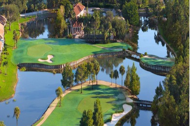 Enjoy refined living in this fully renovated end-unit residence on Glen Eagle Golf and Country Club in Florida - for sale on GolfHomes.com, golf home, golf lot