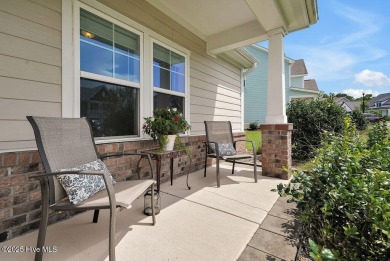 Welcome to this impeccably maintained 4-bedroom home nestled in on Beau Rivage Golf and Resort in North Carolina - for sale on GolfHomes.com, golf home, golf lot