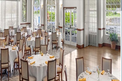 Enjoy refined living in this fully renovated end-unit residence on Glen Eagle Golf and Country Club in Florida - for sale on GolfHomes.com, golf home, golf lot