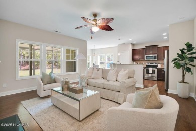Welcome to this impeccably maintained 4-bedroom home nestled in on Beau Rivage Golf and Resort in North Carolina - for sale on GolfHomes.com, golf home, golf lot