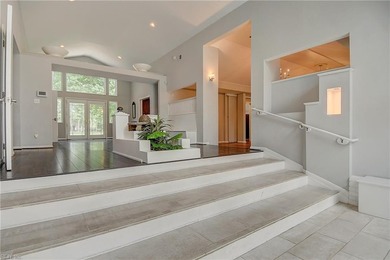 Sprawling transitional 5300 sqft home on just under an acre, set on Cavalier Golf and Yacht Club in Virginia - for sale on GolfHomes.com, golf home, golf lot