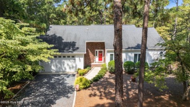 Welcome to 28 Windsong Place - A Serene Retreat in Whispering on Whispering Pines Golf Course in North Carolina - for sale on GolfHomes.com, golf home, golf lot