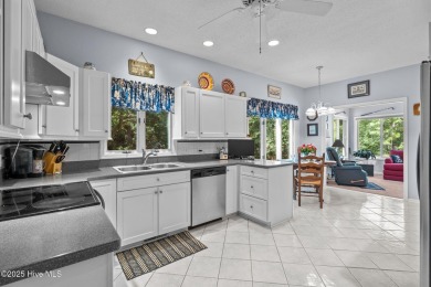 Welcome to 28 Windsong Place - A Serene Retreat in Whispering on Whispering Pines Golf Course in North Carolina - for sale on GolfHomes.com, golf home, golf lot