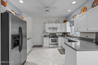 Welcome to 28 Windsong Place - A Serene Retreat in Whispering on Whispering Pines Golf Course in North Carolina - for sale on GolfHomes.com, golf home, golf lot