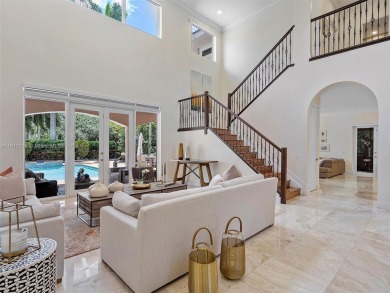 Discover a redefined standard of style and sophistication in on Weston Hills Country Club in Florida - for sale on GolfHomes.com, golf home, golf lot