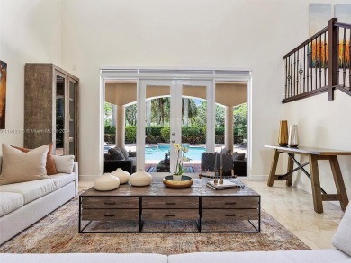 Discover a redefined standard of style and sophistication in on Weston Hills Country Club in Florida - for sale on GolfHomes.com, golf home, golf lot