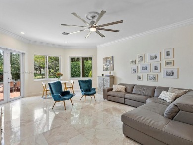 Discover a redefined standard of style and sophistication in on Weston Hills Country Club in Florida - for sale on GolfHomes.com, golf home, golf lot