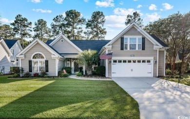 Discover this lovingly maintained 4-bedroom, 3-bath home in the on International Club of Myrtle Beach in South Carolina - for sale on GolfHomes.com, golf home, golf lot