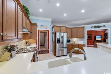 Discover this lovingly maintained 4-bedroom, 3-bath home in the on International Club of Myrtle Beach in South Carolina - for sale on GolfHomes.com, golf home, golf lot