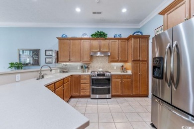 Discover this lovingly maintained 4-bedroom, 3-bath home in the on International Club of Myrtle Beach in South Carolina - for sale on GolfHomes.com, golf home, golf lot