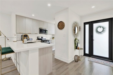 Stunning fully renovated 3-bed, 2-bath townhouse in The on Jim McLean Signature Course in Florida - for sale on GolfHomes.com, golf home, golf lot