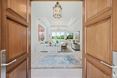 Exceptional Loxahatchee Club lake and golf course views can be on The Loxahatchee Club in Florida - for sale on GolfHomes.com, golf home, golf lot