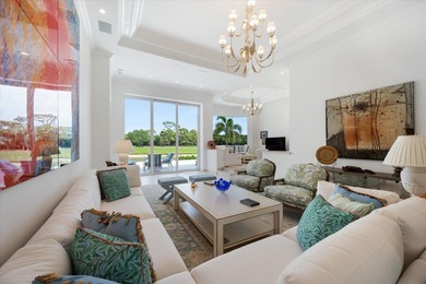 Exceptional Loxahatchee Club lake and golf course views can be on The Loxahatchee Club in Florida - for sale on GolfHomes.com, golf home, golf lot