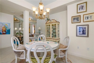 This first floor coach home has a spectacular lake and island on Lely Resort Golf and Country Club in Florida - for sale on GolfHomes.com, golf home, golf lot
