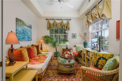 This first floor coach home has a spectacular lake and island on Lely Resort Golf and Country Club in Florida - for sale on GolfHomes.com, golf home, golf lot