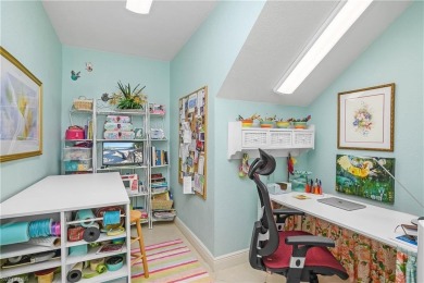 This first floor coach home has a spectacular lake and island on Lely Resort Golf and Country Club in Florida - for sale on GolfHomes.com, golf home, golf lot