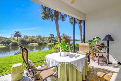 This first floor coach home has a spectacular lake and island on Lely Resort Golf and Country Club in Florida - for sale on GolfHomes.com, golf home, golf lot