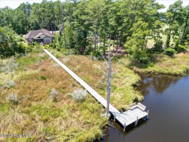 This beautiful waterfront home has been meticulously maintained on Harbour Point Golf Club in North Carolina - for sale on GolfHomes.com, golf home, golf lot