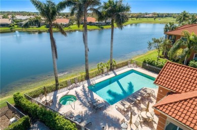 This first floor coach home has a spectacular lake and island on Lely Resort Golf and Country Club in Florida - for sale on GolfHomes.com, golf home, golf lot