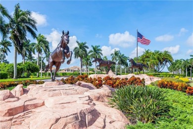 This first floor coach home has a spectacular lake and island on Lely Resort Golf and Country Club in Florida - for sale on GolfHomes.com, golf home, golf lot