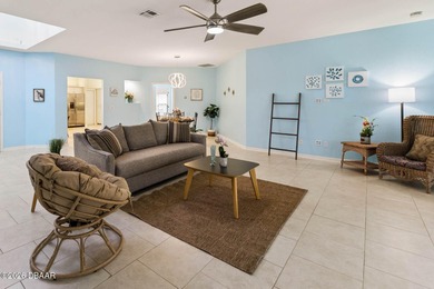 An aviation lifestyle awaits in this exceptional home located on Spruce Creek Golf Club in Florida - for sale on GolfHomes.com, golf home, golf lot