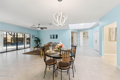 An aviation lifestyle awaits in this exceptional home located on Spruce Creek Golf Club in Florida - for sale on GolfHomes.com, golf home, golf lot