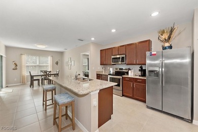 Fully furnished, turnkey home with a private south-facing on Herons Glen Golf and Country Club in Florida - for sale on GolfHomes.com, golf home, golf lot