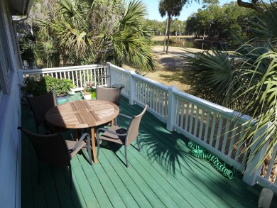 Recently updated custom home overlooking the golf course in on The Plantation Course At Edisto in South Carolina - for sale on GolfHomes.com, golf home, golf lot