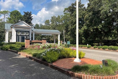 JUST STEPS TO THE WACCAMAW RIVER and a short bike ride to the on The Reserve Golf Club at Pawleys Island in South Carolina - for sale on GolfHomes.com, golf home, golf lot