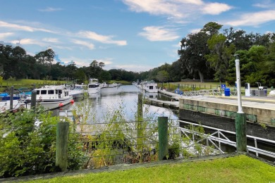 JUST STEPS TO THE WACCAMAW RIVER and a short bike ride to the on The Reserve Golf Club at Pawleys Island in South Carolina - for sale on GolfHomes.com, golf home, golf lot