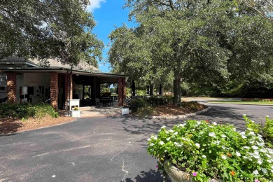 JUST STEPS TO THE WACCAMAW RIVER and a short bike ride to the on The Reserve Golf Club at Pawleys Island in South Carolina - for sale on GolfHomes.com, golf home, golf lot