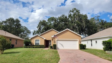 Well maintained 3 bedroom 2 bathroom home located in established on Cypresswood Golf and Country Club in Florida - for sale on GolfHomes.com, golf home, golf lot