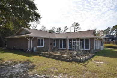 Did you ever want to live on an island? This one of a kind large on Wedgefield Plantation Golf Club in South Carolina - for sale on GolfHomes.com, golf home, golf lot