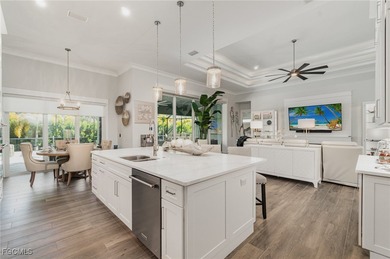 Step into elevated Southwest Cape Coral living where thoughtful on Royal Tee Country Club in Florida - for sale on GolfHomes.com, golf home, golf lot