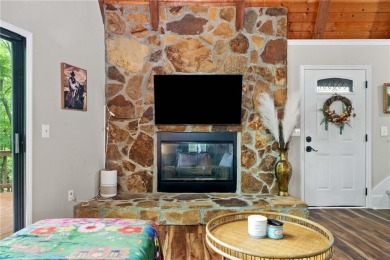 A Tranquil Woodland Escape in Lake Arrowhead awaits the lucky on The Highlands Course at Lake Arrowhead in Georgia - for sale on GolfHomes.com, golf home, golf lot