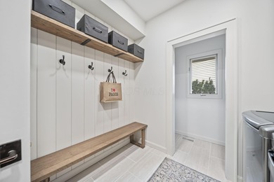 Welcome to 5877 Tarton Circle S in Muirfield Village. Offering a on Country Club At Muirfield Village in Ohio - for sale on GolfHomes.com, golf home, golf lot