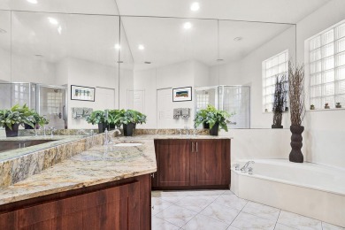 Located in Oxford Estates in posh Boca Raton, this small gated on Boca Lago Golf and Country Club in Florida - for sale on GolfHomes.com, golf home, golf lot