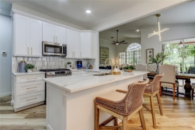 SPECTACULAR SETTING overlooking the Westchase Golf Course with on Westchase Golf Club in Florida - for sale on GolfHomes.com, golf home, golf lot