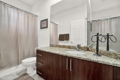 Located in Oxford Estates in posh Boca Raton, this small gated on Boca Lago Golf and Country Club in Florida - for sale on GolfHomes.com, golf home, golf lot