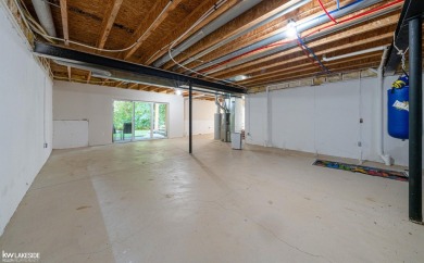 WELCOME TO THIS LUXURY AND 2025 FULLY RENOVATED RANCH CONDO on Stony Creek Metropark Golf Course in Michigan - for sale on GolfHomes.com, golf home, golf lot