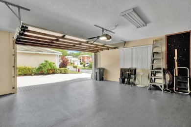 Located in Oxford Estates in posh Boca Raton, this small gated on Boca Lago Golf and Country Club in Florida - for sale on GolfHomes.com, golf home, golf lot
