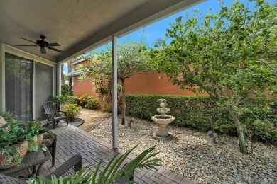 Located in Oxford Estates in posh Boca Raton, this small gated on Boca Lago Golf and Country Club in Florida - for sale on GolfHomes.com, golf home, golf lot