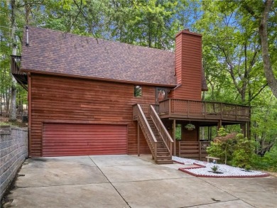 A Tranquil Woodland Escape in Lake Arrowhead awaits the lucky on The Highlands Course at Lake Arrowhead in Georgia - for sale on GolfHomes.com, golf home, golf lot