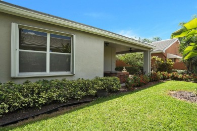 Located in Oxford Estates in posh Boca Raton, this small gated on Boca Lago Golf and Country Club in Florida - for sale on GolfHomes.com, golf home, golf lot
