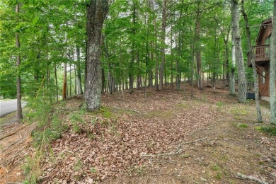 A Tranquil Woodland Escape in Lake Arrowhead awaits the lucky on The Highlands Course at Lake Arrowhead in Georgia - for sale on GolfHomes.com, golf home, golf lot