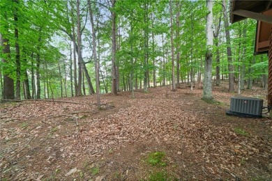 A Tranquil Woodland Escape in Lake Arrowhead awaits the lucky on The Highlands Course at Lake Arrowhead in Georgia - for sale on GolfHomes.com, golf home, golf lot
